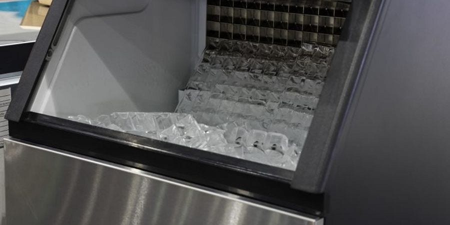 A close up of an escalator with ice on the steps
